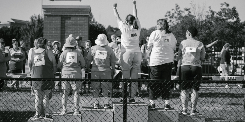 Black and white photo on running track | medical volunteers | Special Olympics Ohio
